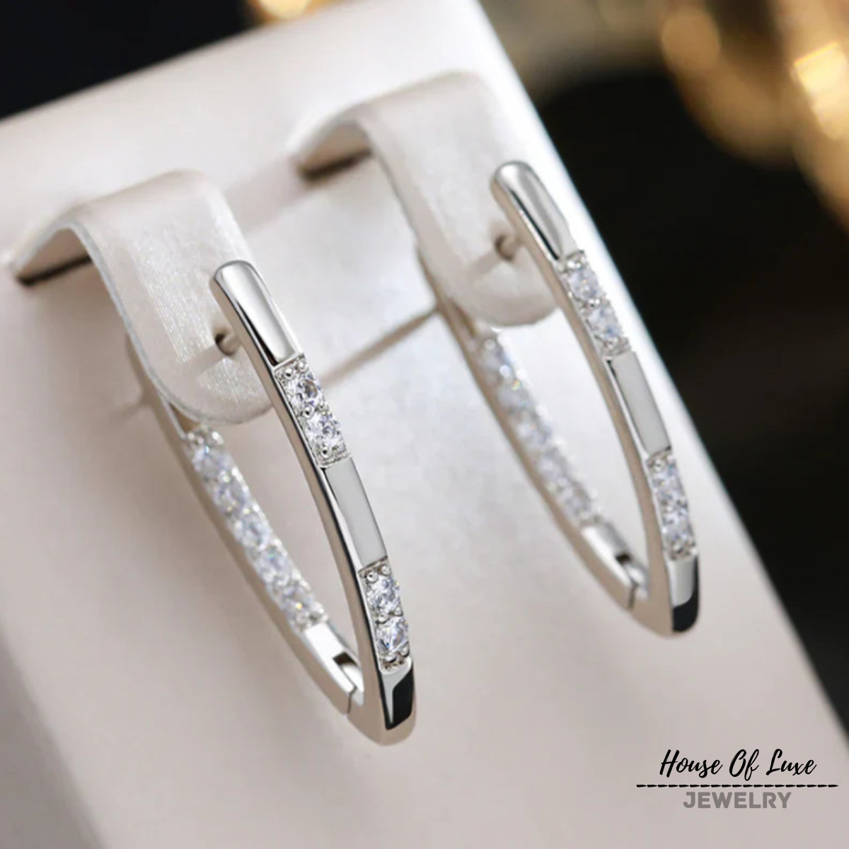 ELEGANT ZIRCONIA EARRINGS IN GOLD