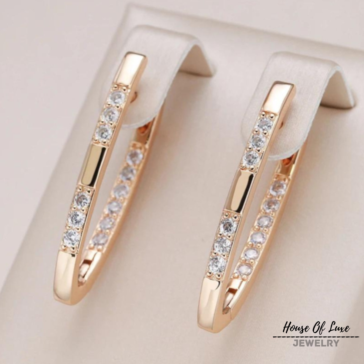 ELEGANT ZIRCONIA EARRINGS IN GOLD