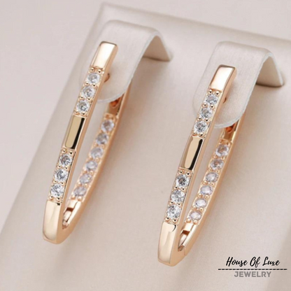 ELEGANT ZIRCONIA EARRINGS IN GOLD