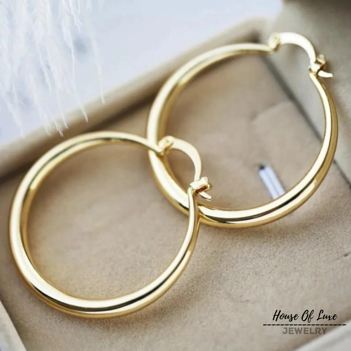 Goldene große Creolen Ohrringe